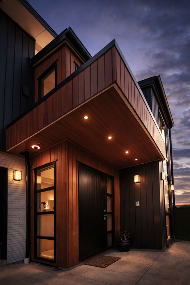 Architectural elevation drawing of a modern residential home by Nomad Design
